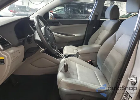 2016 Hyundai Tucson Limited из США, поврежденный, VIN KM8J33A23GU148672